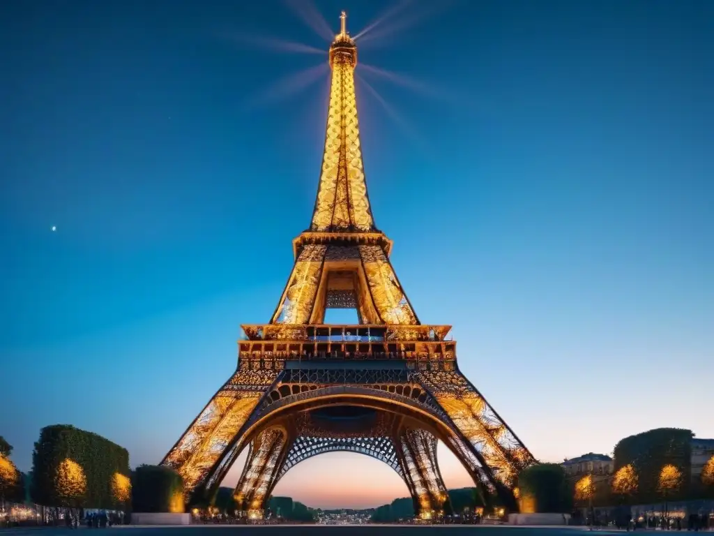 Impresionante fotografía nocturna de la Torre Eiffel iluminada en París, Francia